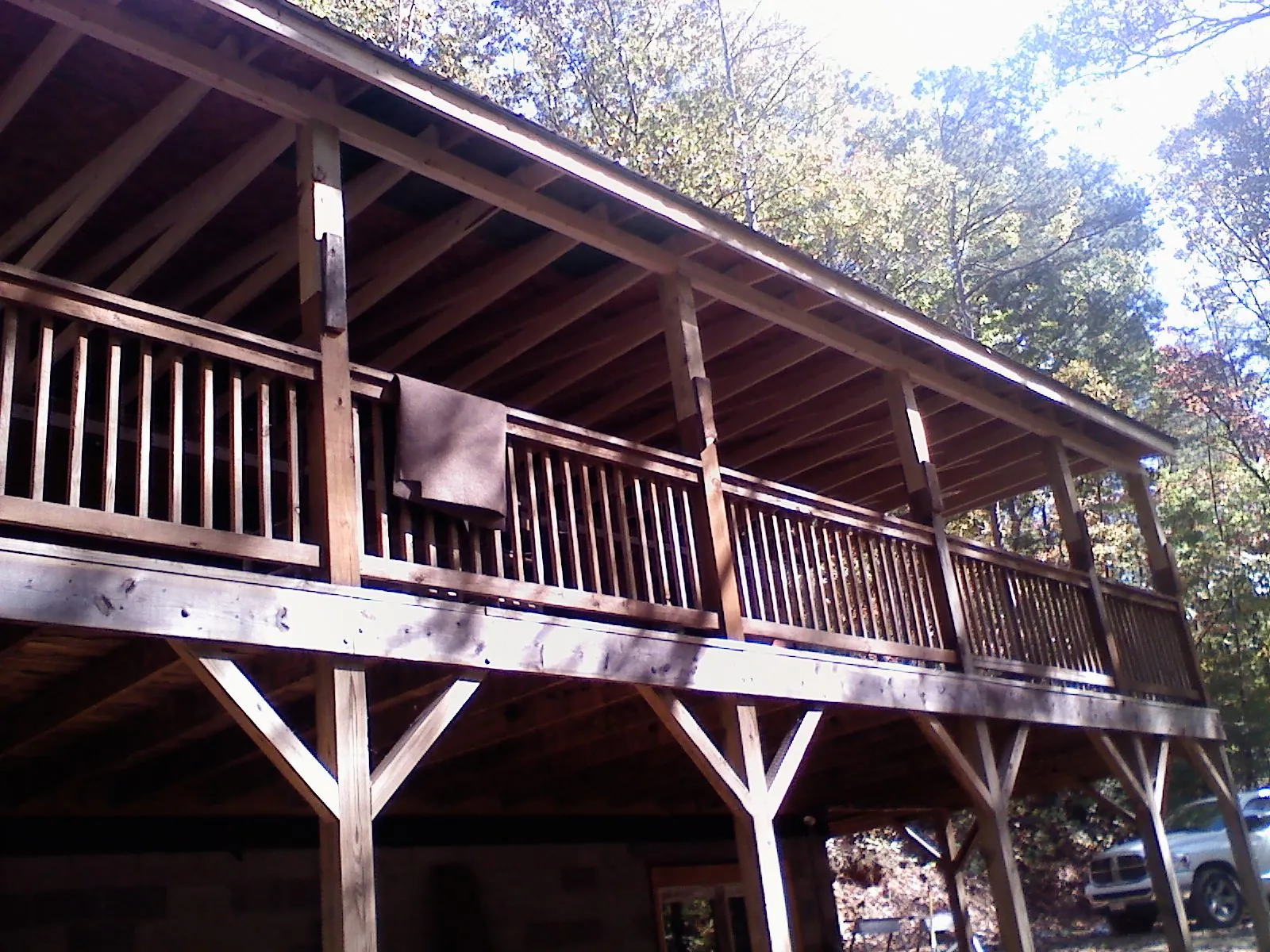 Timber framing under a new elevated porch and deck — Roof Leak Repair in Winthrop Harbor by Roofing Brothers